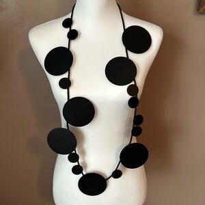 NWOT Long boutique-style black statement necklace.